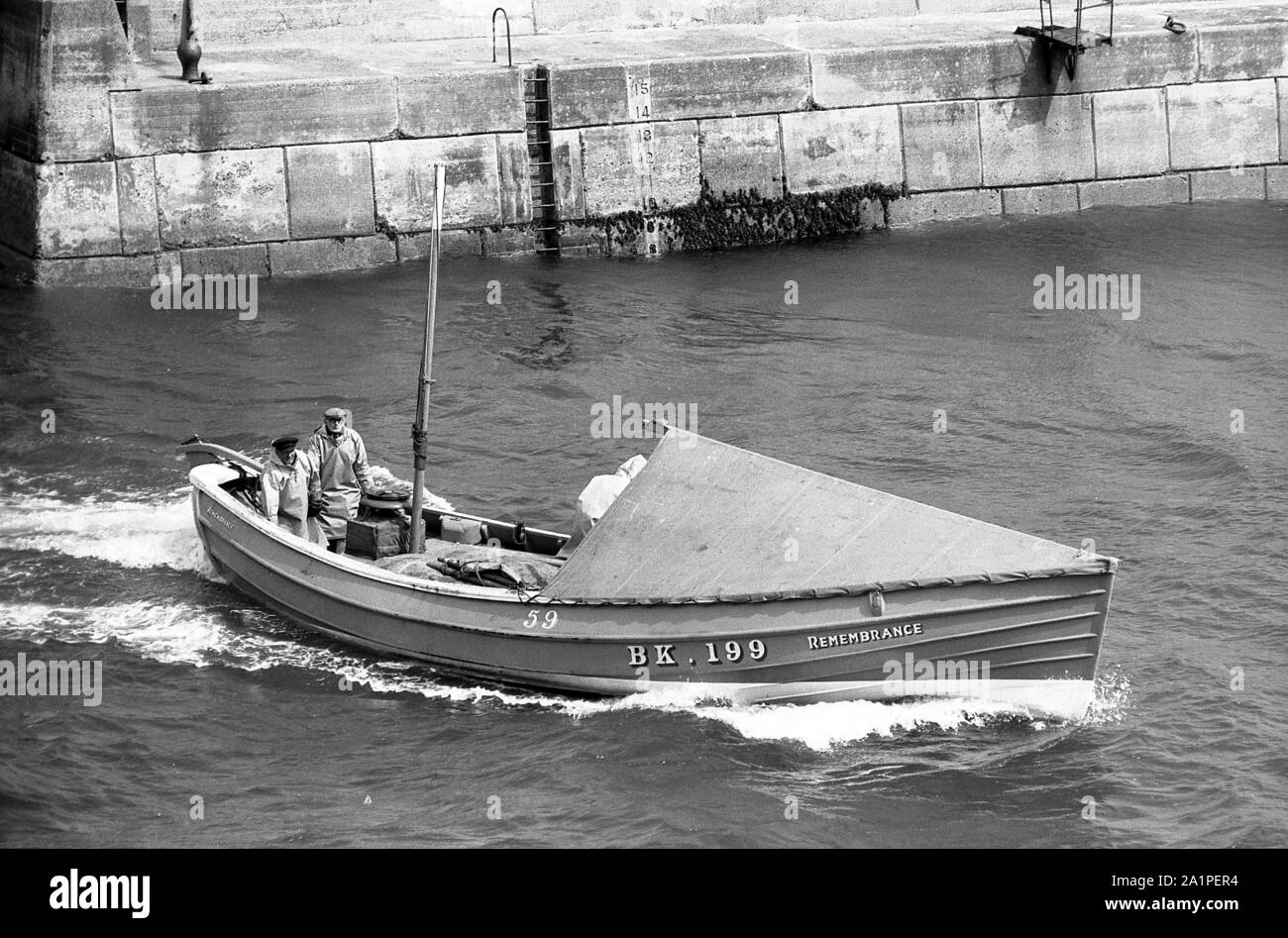 Fishing Coble Remembrance, BK 199, arriving at Seahouses, Northumberland, c.1972 Stock Photo