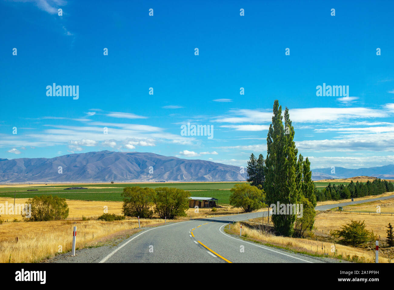 asphalt road through Canterbury region of New Zealand Stock Photo