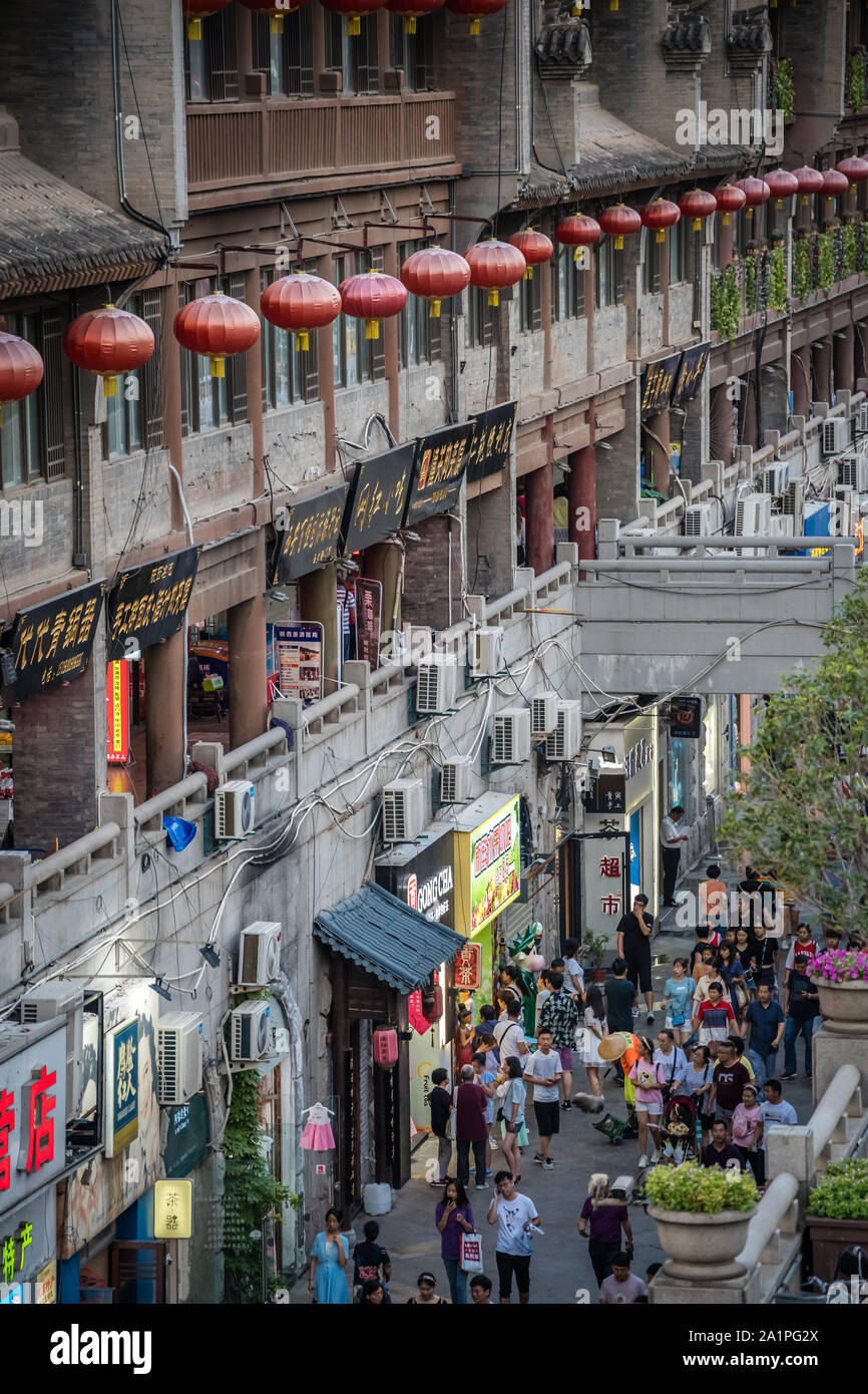 Xian China July 2019 Crowds Walking On Shopping Street In Xian xian-china-july-2019-crowds-walking-on-shopping-street-in-xian
