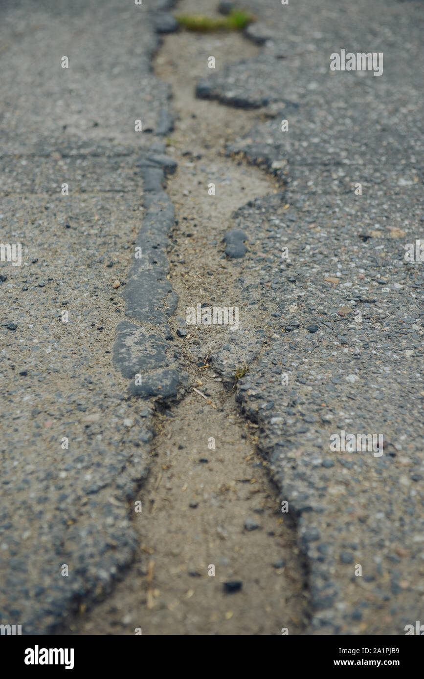 Broken asphalt pavement hi-res stock photography and images - Alamy