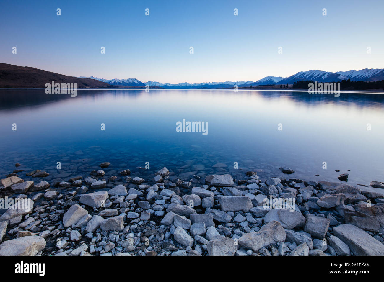 Lake Tekapo Sunset on a Sunny Evening in New Zealand Stock Photo - Alamy