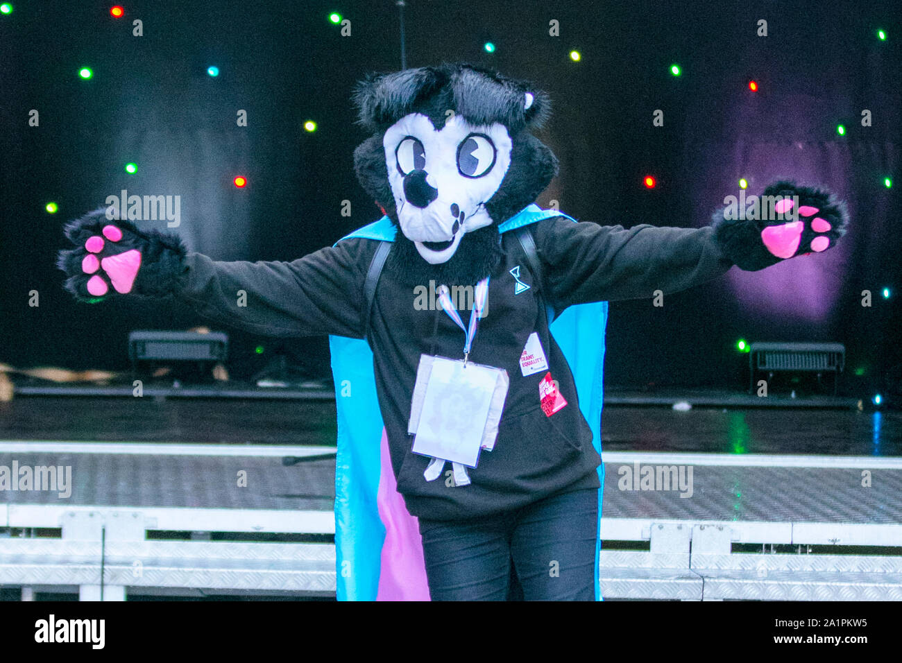 Preston, Lancashire. UK Entertainment. 28th Sept, 2019. A sunny afternoon for the 8th annual city Gay Pride Festival. Megan aged 13 years, who likes to be known as Jack wearing a border collie animal mascot costume begin in the city centre Flag Market.  Credit: MediaWorldImages/Alamy Live News Stock Photo