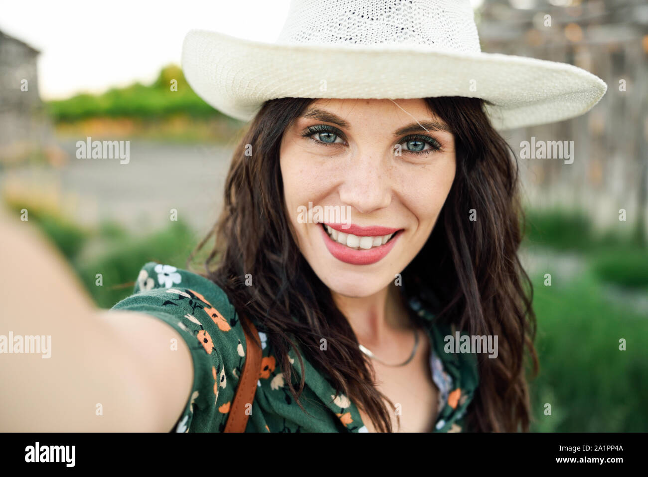 Hiker young woman taking a selfie photograph outdoors Stock Photo - Alamy