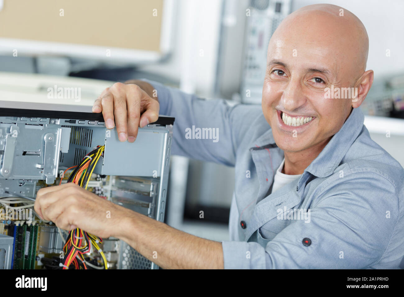 working with multicolored cables in a computer Stock Photo Alamy