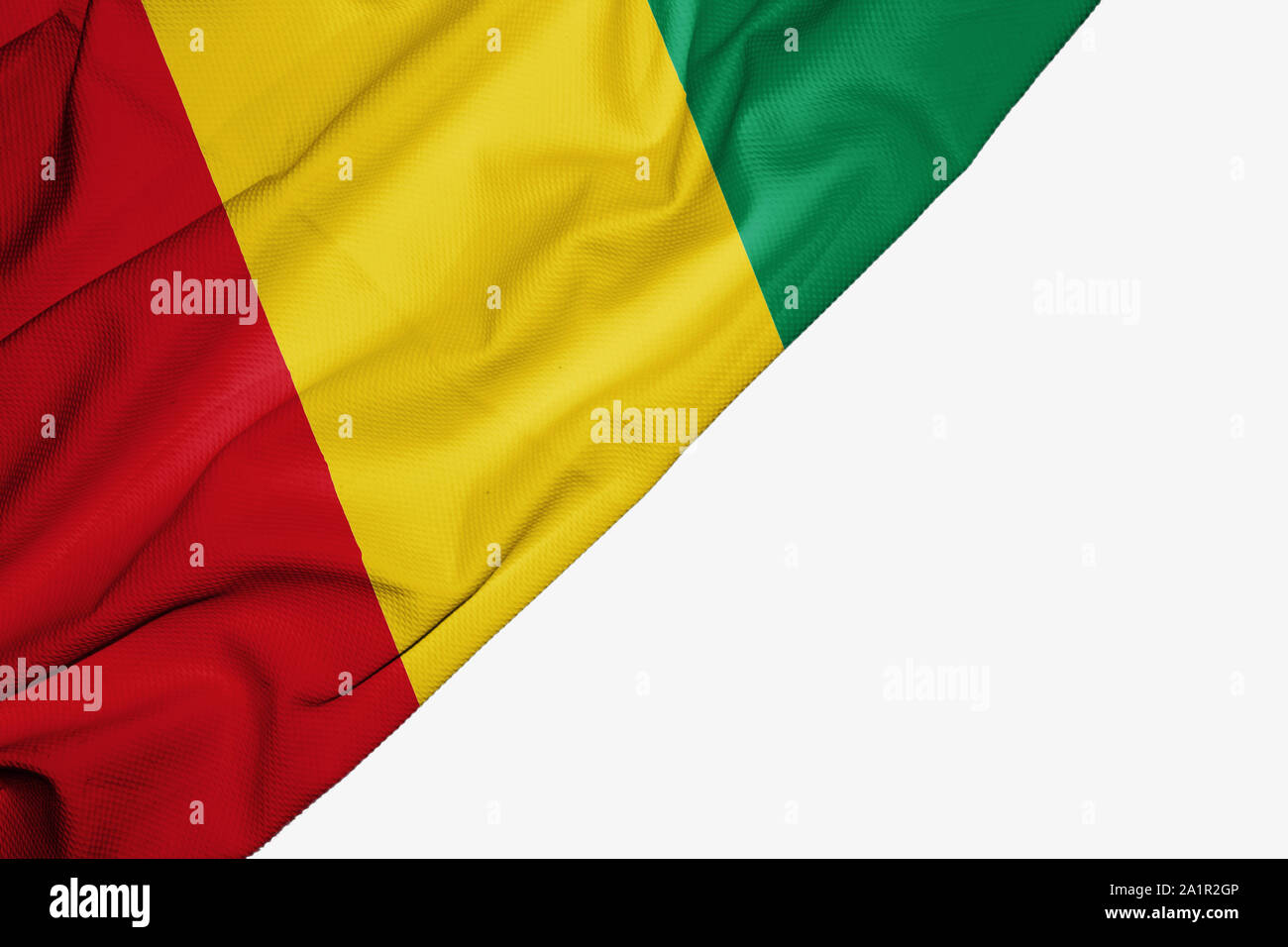 Guinea flag of fabric with copyspace for your text on white background Stock Photo