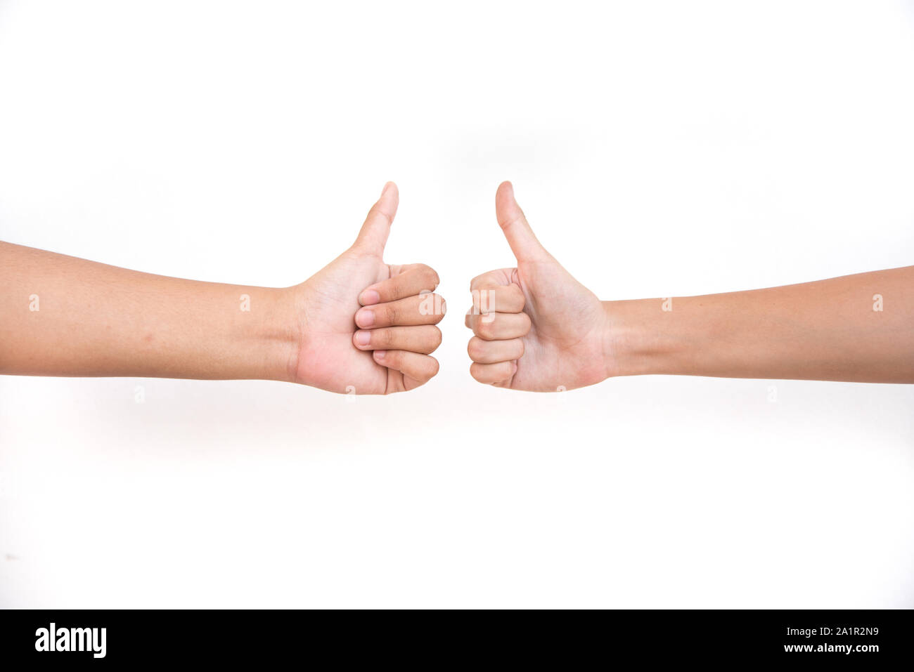 thumps up on white background Stock Photo