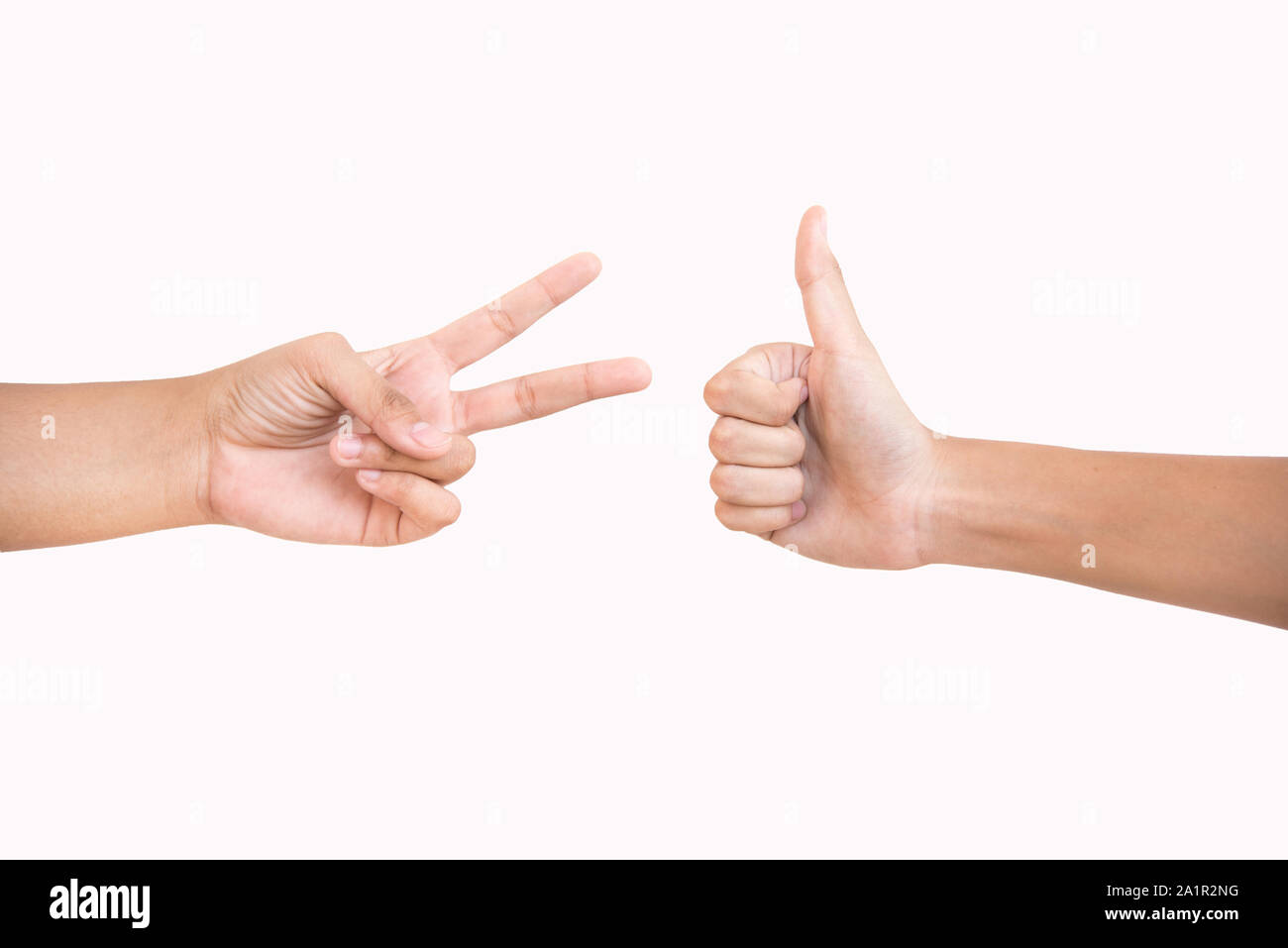 thumps up and scissor  on white background Stock Photo