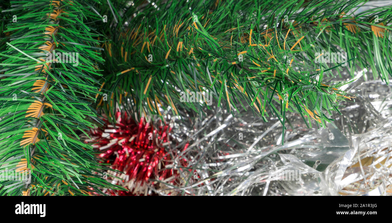 Silver tinsel christmas tree hi-res stock photography and images - Alamy