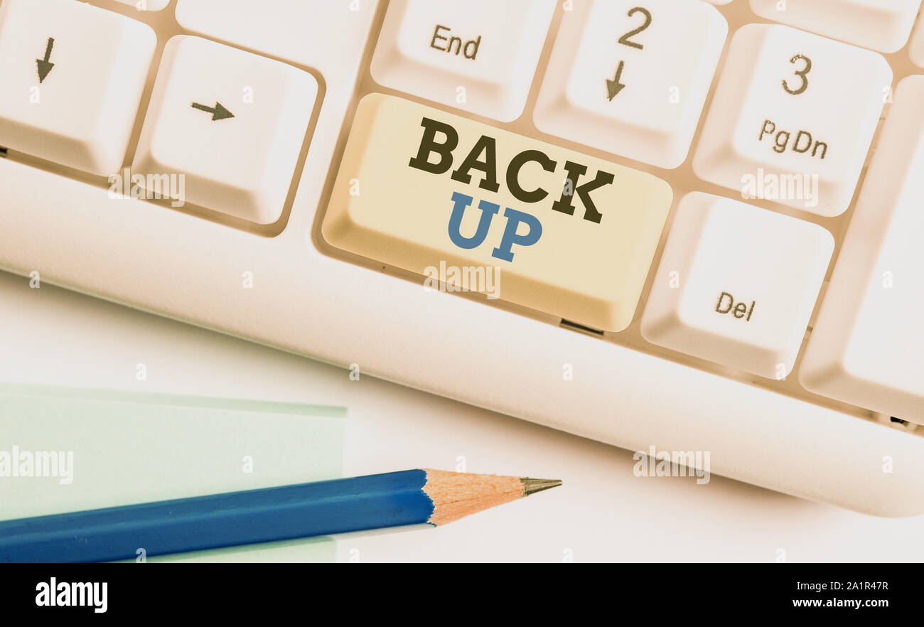 Writing note showing Back Up. Business concept for saving important ...