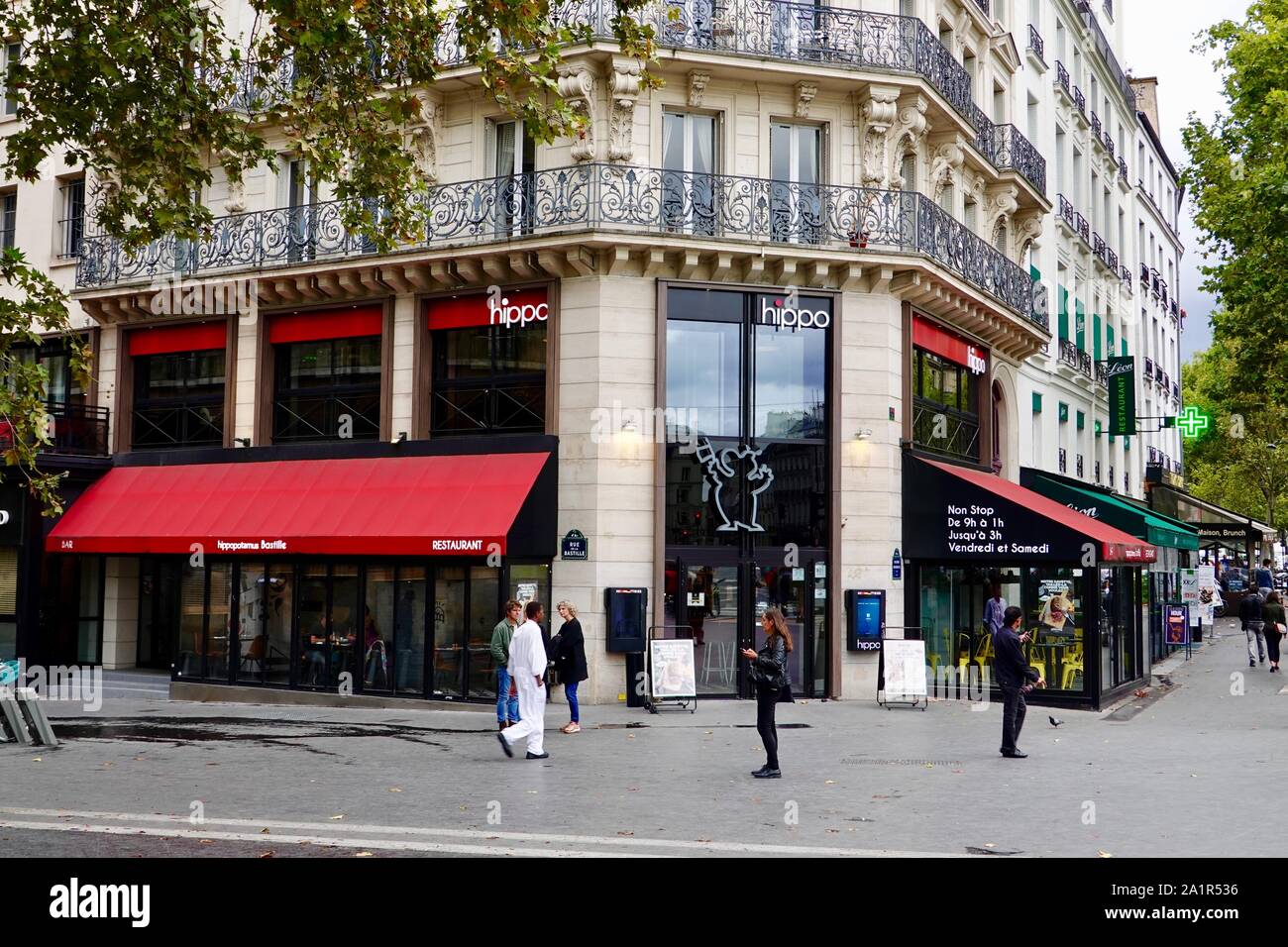 People in front of the Hippopotamus Steakhouse Paris Bastille and blvd Beaumarchais, restaurant