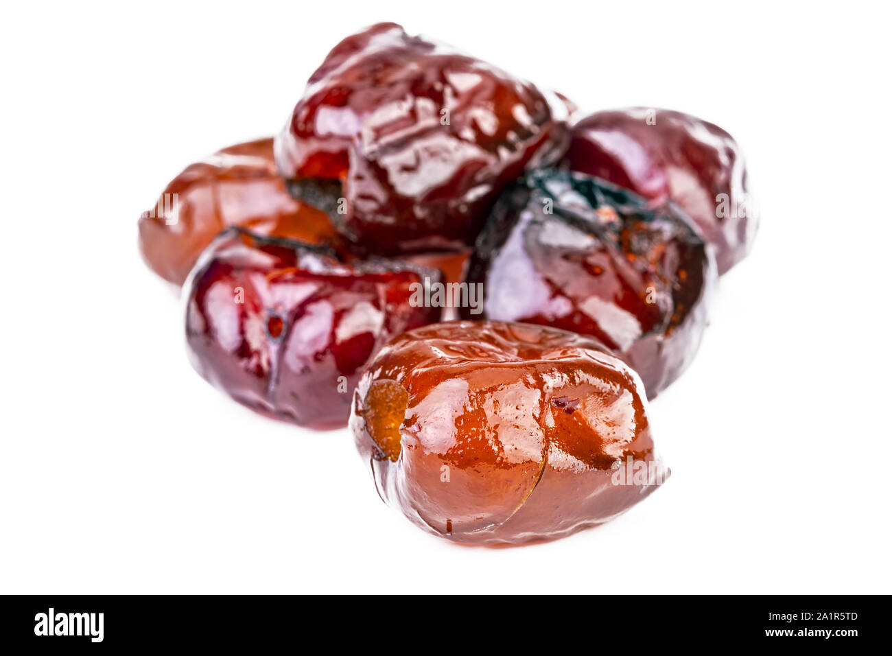 Sweet Pitted Chinese Red Dates Jujube Preserved In Sirup On White Plate Colse Up Stock Photo Alamy