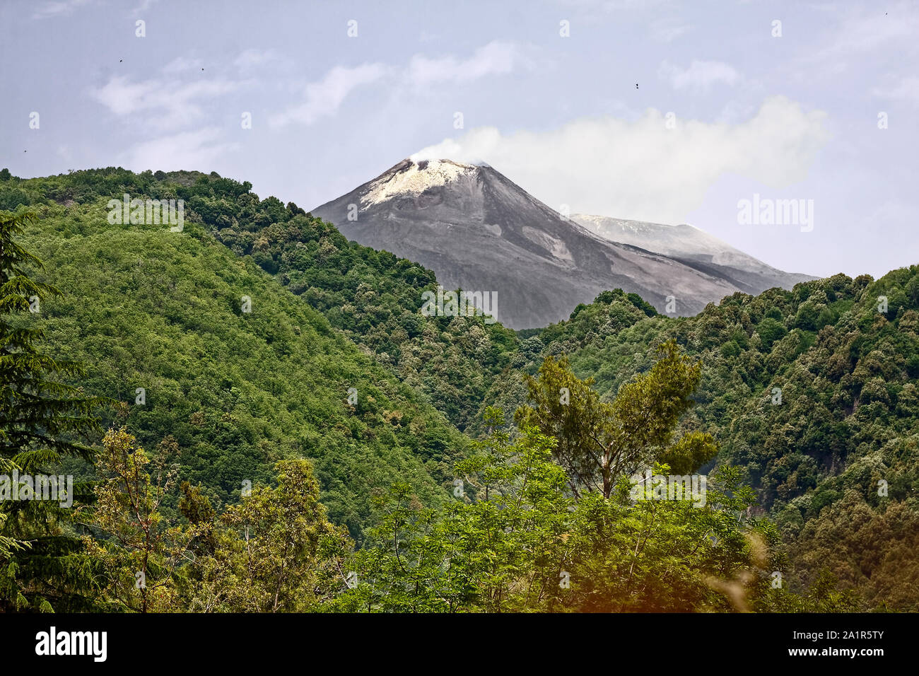 Mount Etna; Europe's largest active volcano; nature, steam erupting, lava, destruction, devastation, green vegetation, Catania; Sicily; Italy; summer; Stock Photo