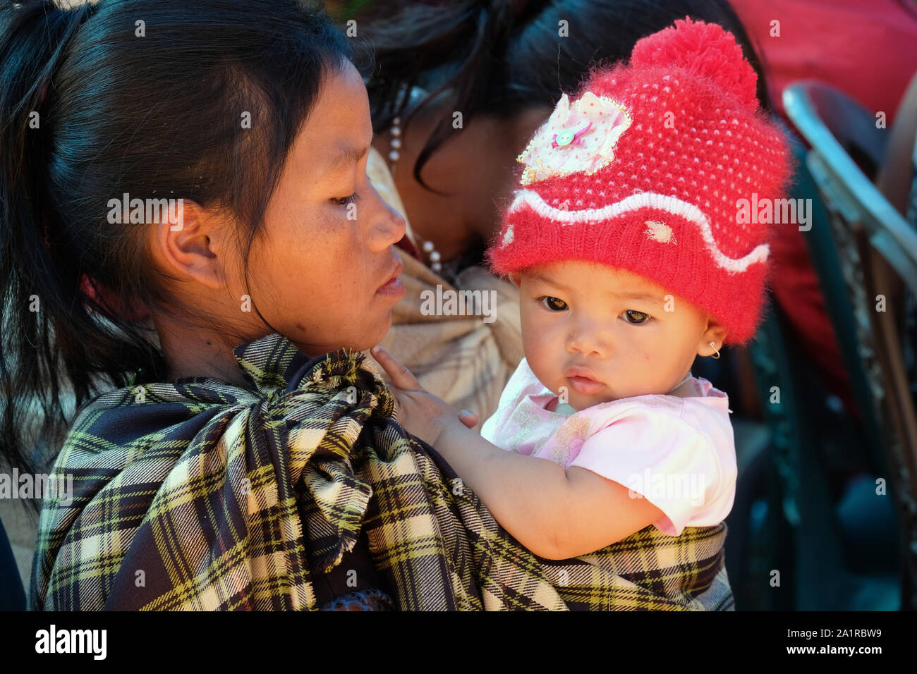 Mother with her baby from the Khasi tribe ethnic group in the village of Jarain in the Khasi