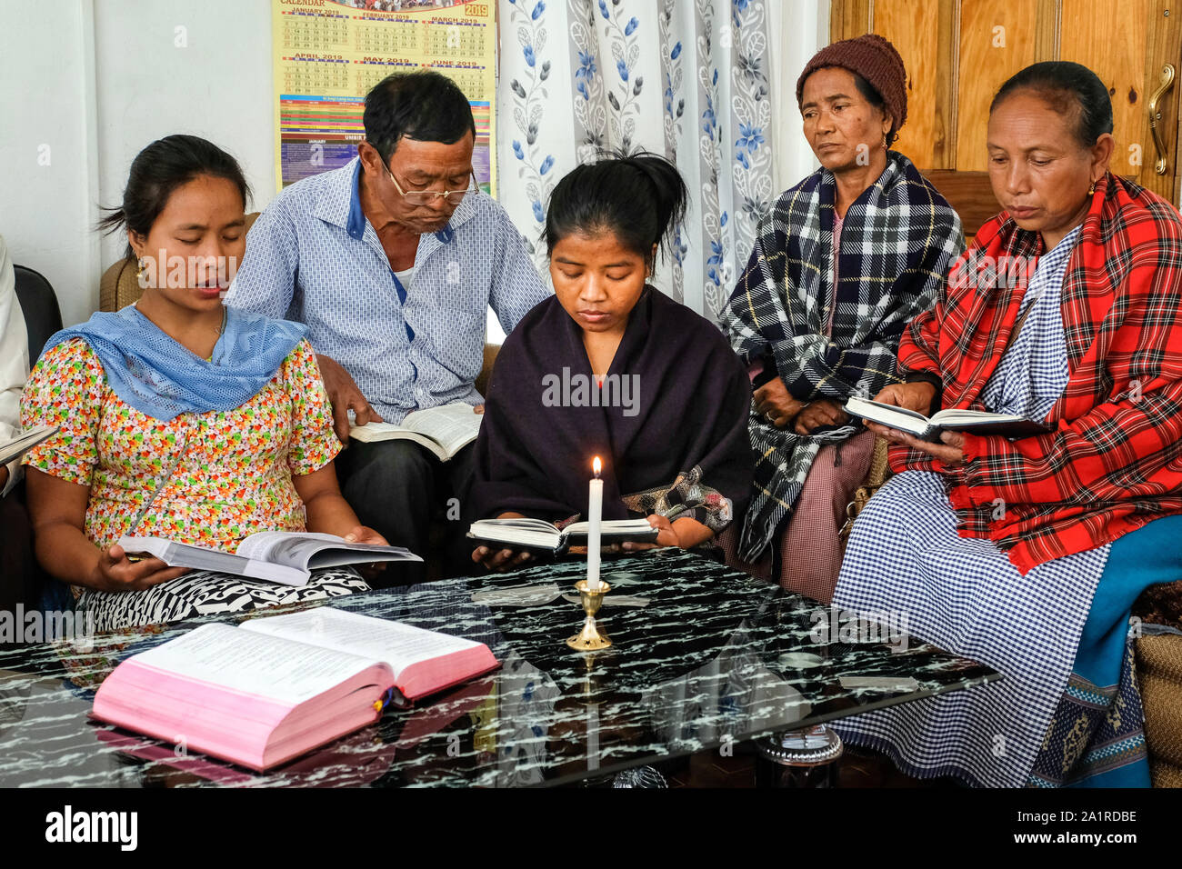 Weekly prayer meeting of a Catholic Small Christian Community in the village of Mawlyndepp near Shillong, Meghalaya State, Northeast India Stock Photo