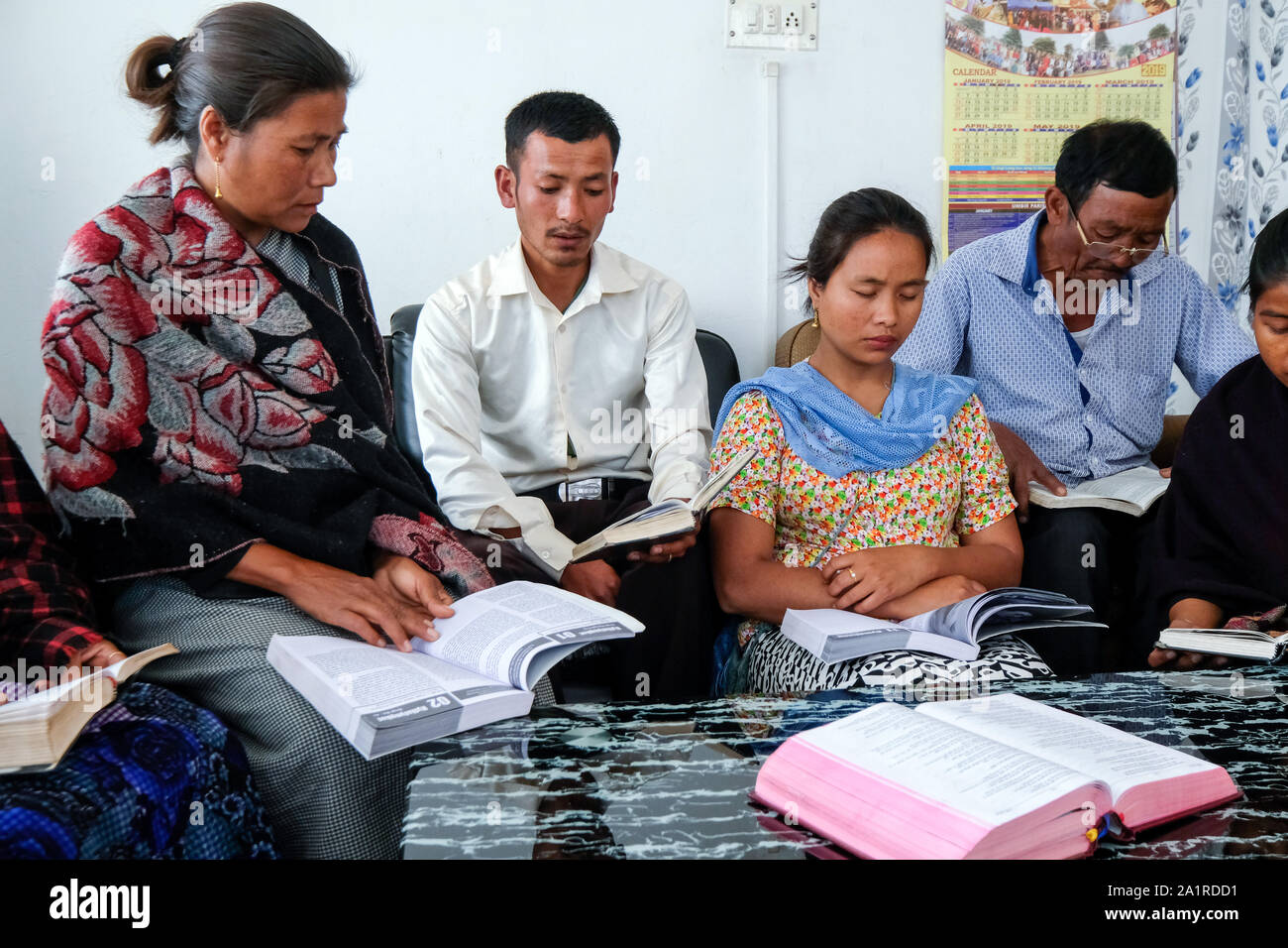 Weekly prayer meeting of a Catholic Small Christian Community in the village of Mawlyndepp near Shillong, Meghalaya State, Northeast India Stock Photo