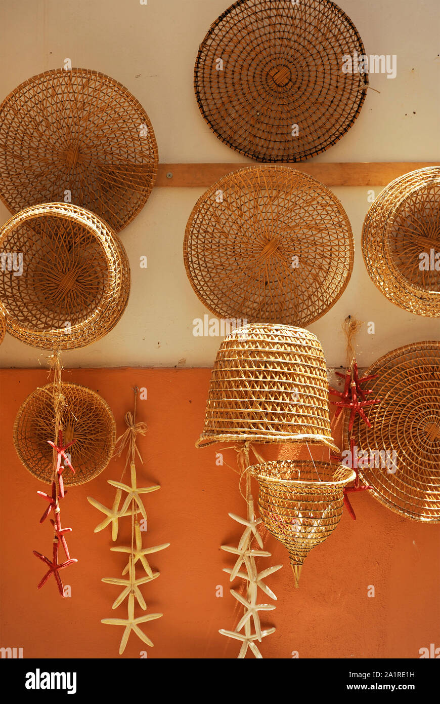 Old fishing nets and baskets made of straw and handmade. Gallipoli, Apulia,  Italy Stock Photo - Alamy