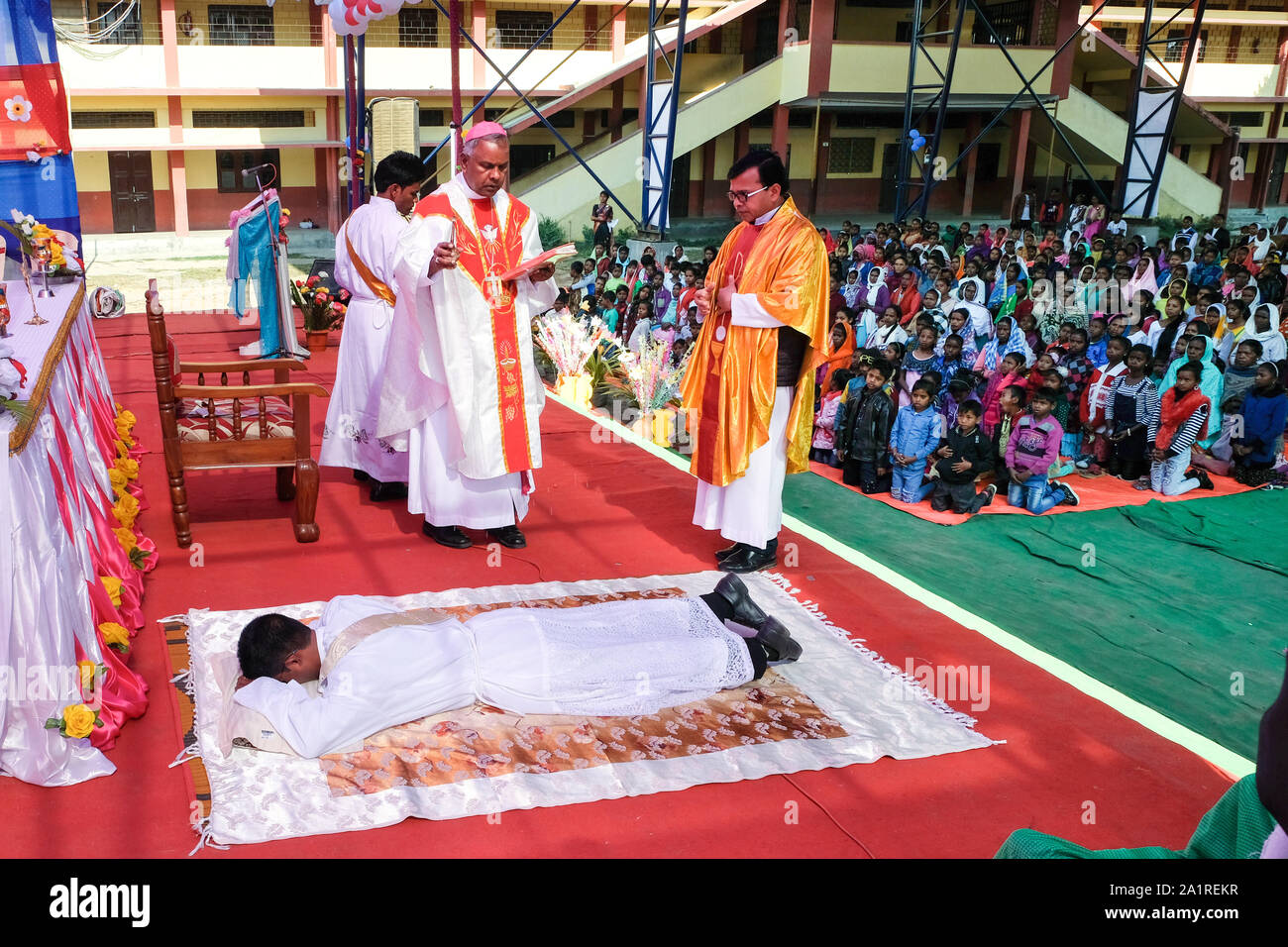 Ordination of a catholic priest by Bishop Michael Akasius Toppo, Bishop of the Diocese of Tezpur in Balipara, Assam State, India Stock Photo