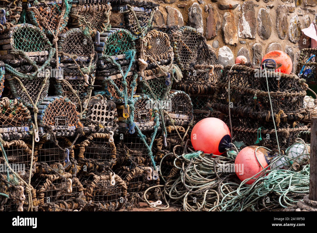 Lobster pots at Clovelly harbour on the north Devon coast Stock Photo