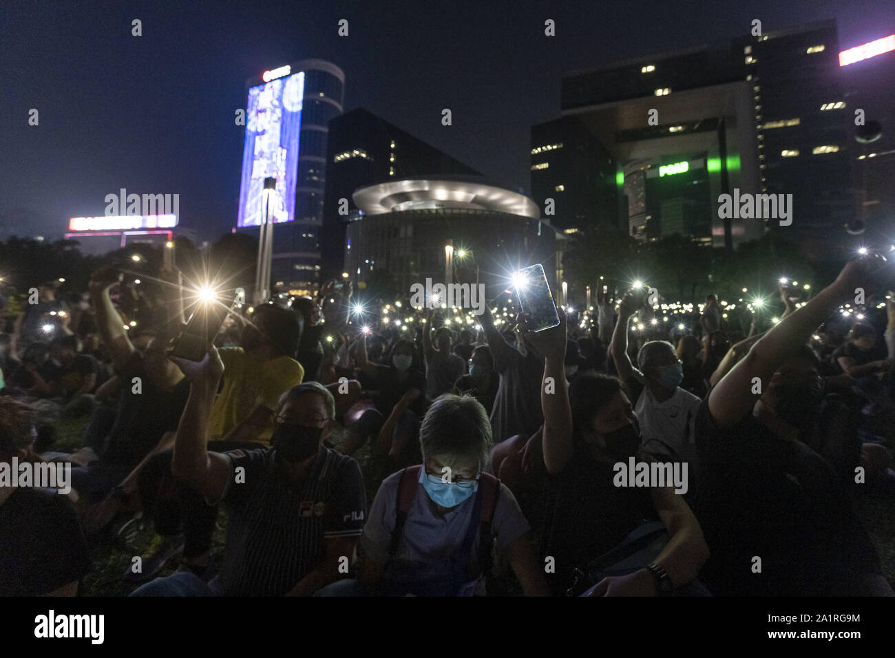 Hong Kong, China. 28th Sep, 2019. Thousands of pro democracy protesters gathered in Hong Kong's Tamar park to attend the Anti Authoritarianism Rally on the 5th anniversary of the start of the Yellow Umbrella Revolution. After the rally thousands of protesters approched the Cnetral Government Complex and began throwing stones and molotov cocktails at the barriers surrounding the complex. Hong Kong police deployed a water cannon vehicle and riot police to disperse the protesters. Credit: Adryel Talamantes/ZUMA Wire/Alamy Live News Stock Photo