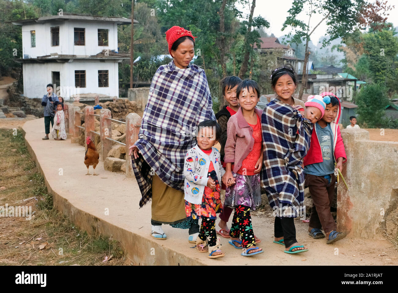 Woman with a group of children in the village Khrang, Khasi-Hills, state of Meghalaya, India Stock Photo