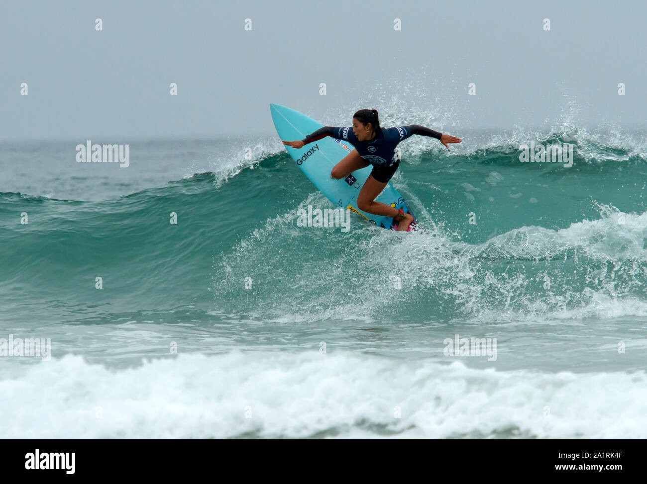 Pro surfer Mahina Maeda of Japan competing at the 2019 US Open on Surfing Stock Photo