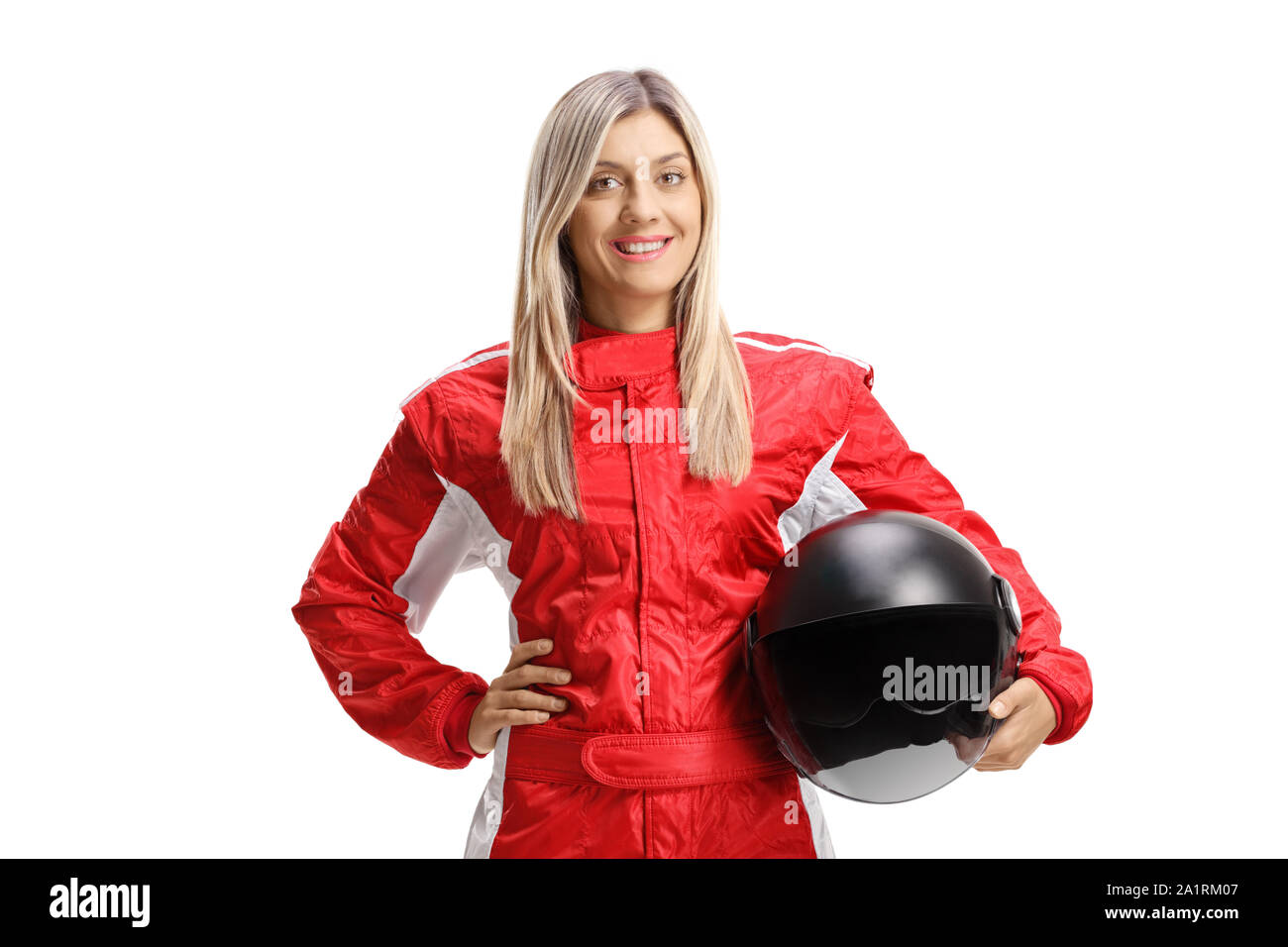 Young female racer holding a helmet isolated on white background Stock Photo