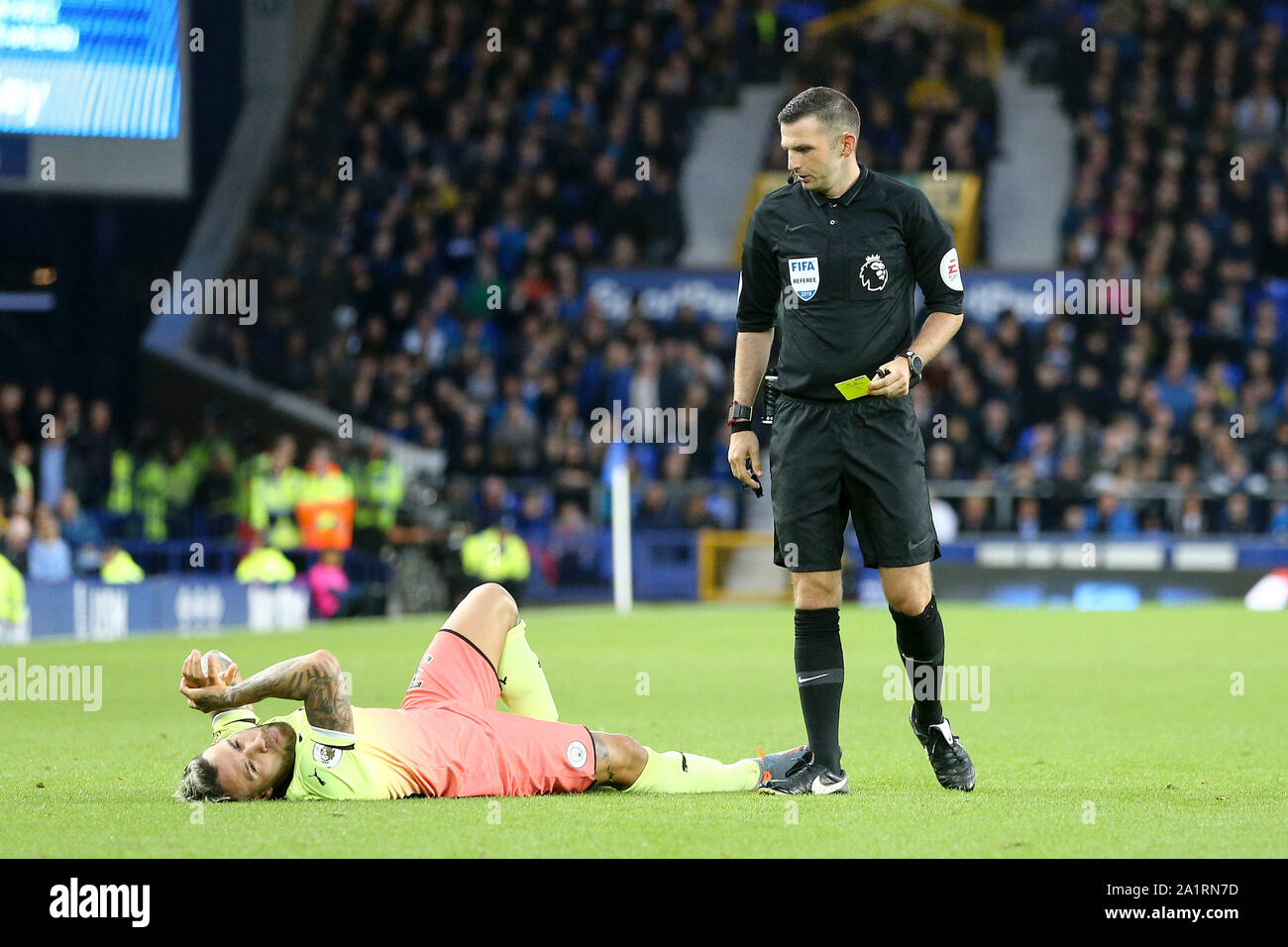 Liverpool, UK. 28th Sep, 2019. Nicolas Otamendi of Manchester City receives a yellow card from referee Michael Oliver. Premier League match, Everton v Manchester City at Goodison Park in Liverpool on Saturday 28th September 2019. this image may only be used for Editorial purposes. Editorial use only, license required for commercial use. No use in betting, games or a single club/league/player publications. pic by Chris Stading/Andrew Orchard sports photography/Alamy Live news Credit: Andrew Orchard sports photography/Alamy Live News Stock Photo