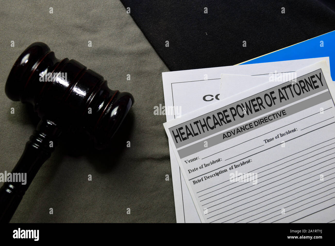 Healthcare Power Of Attorney text on Document and gavel isolated on office desk. Law concept