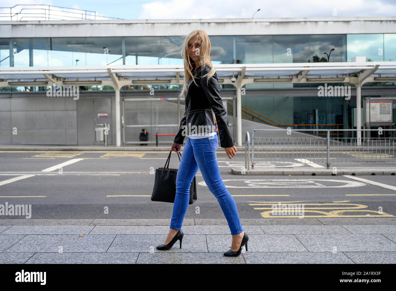 Bus Stop Uk London Woman Waiting High Resolution Stock Photography and ...