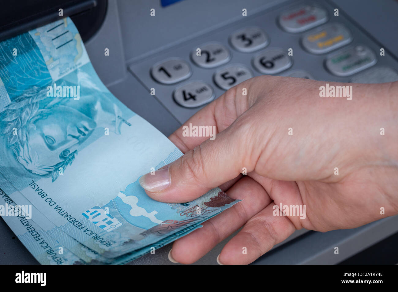 brazilian-money-withdrawn-from-an-atm-stock-photo-alamy