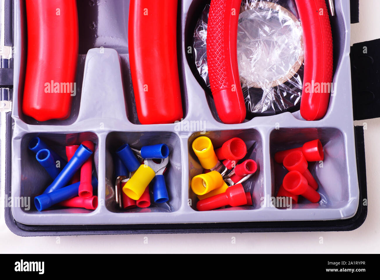 close up photograph of electrical tools and components toolbox Stock