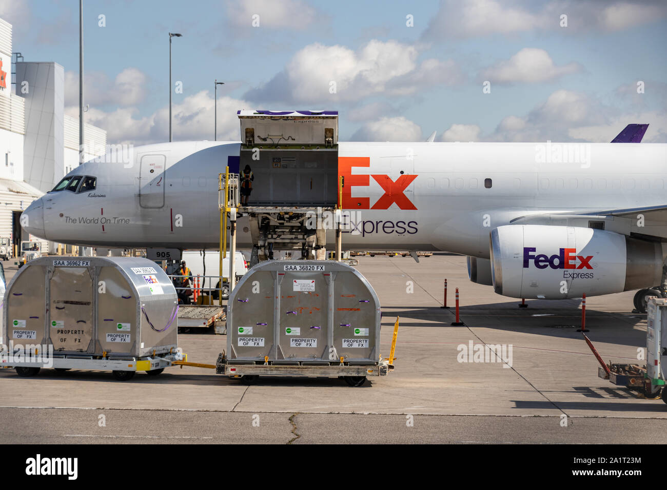 Front of FedEx Express Boeing 757-2F cargo plane being loaded at Toronto Pearson Intl. Airport. Stock Photo