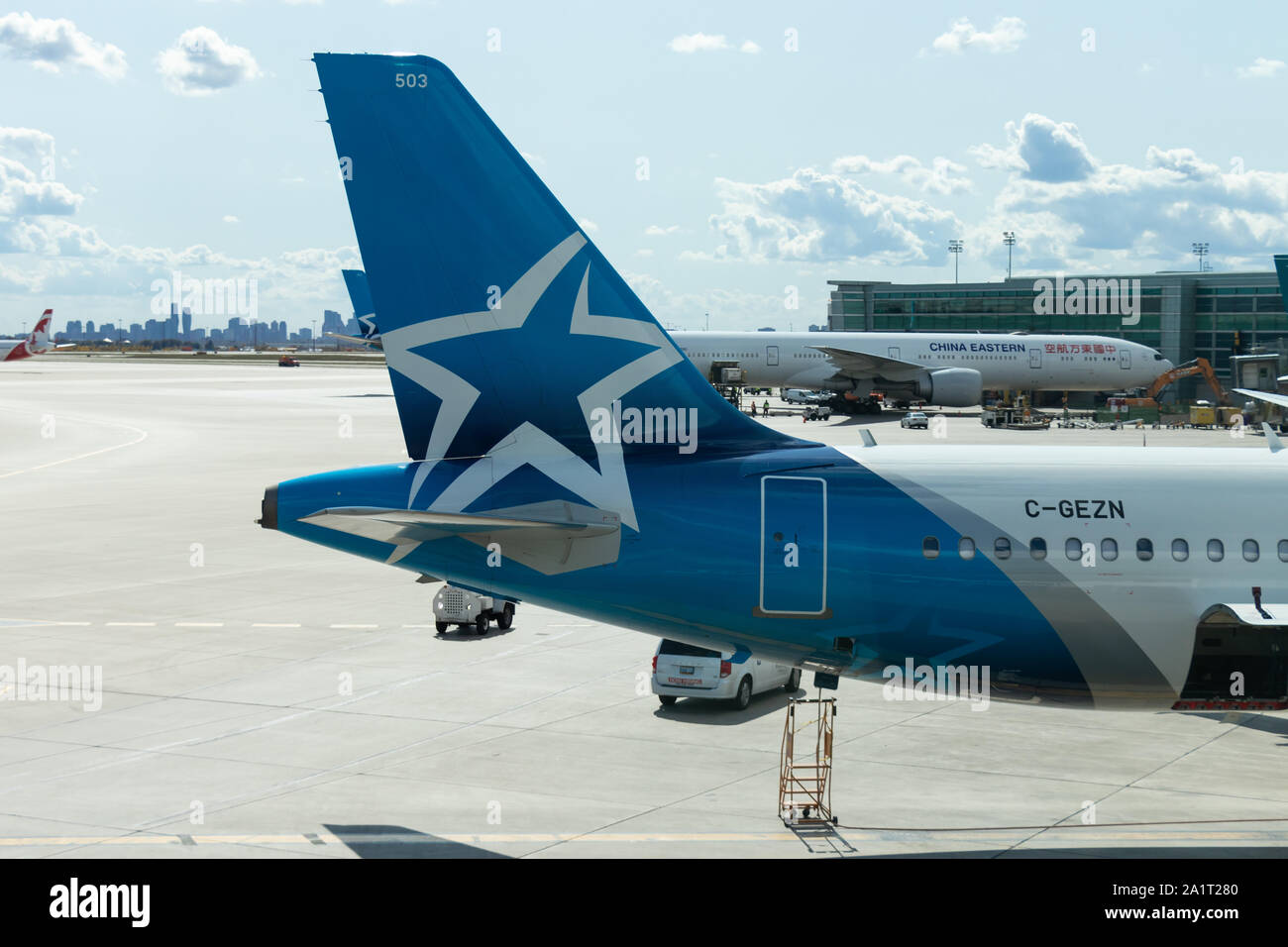 Tail fin logo on Air Transat A321 while parked at a gate at Toronto Pearson Intl. Airport. Stock Photo