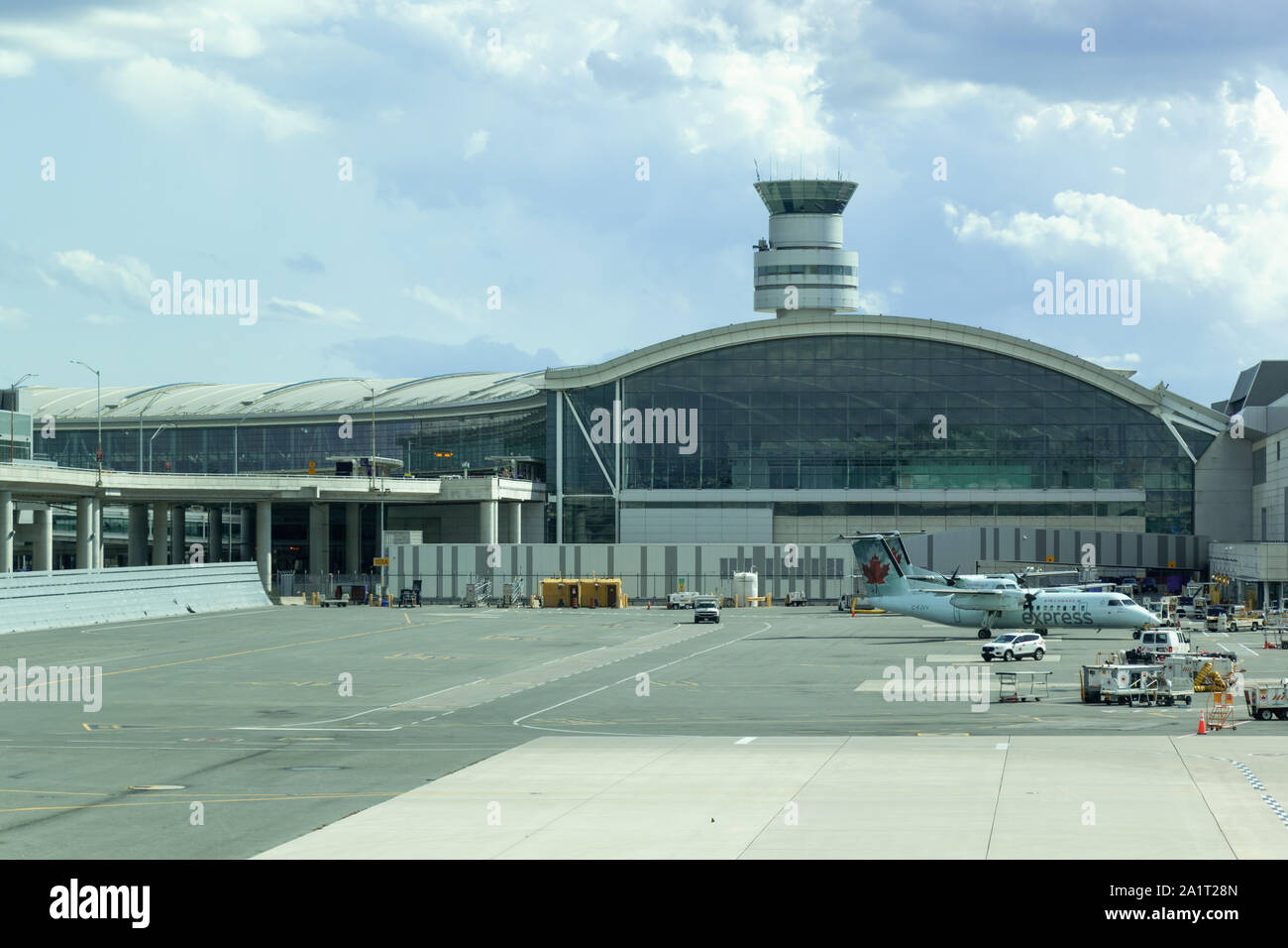 Terminal 1 building at Toronto Pearson Intl Airport with Control Tower seen above. Stock Photo