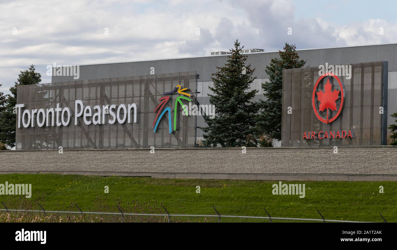 Toronto Pearson and Air Canada logo on billboards alongside Highway 401. Stock Photo