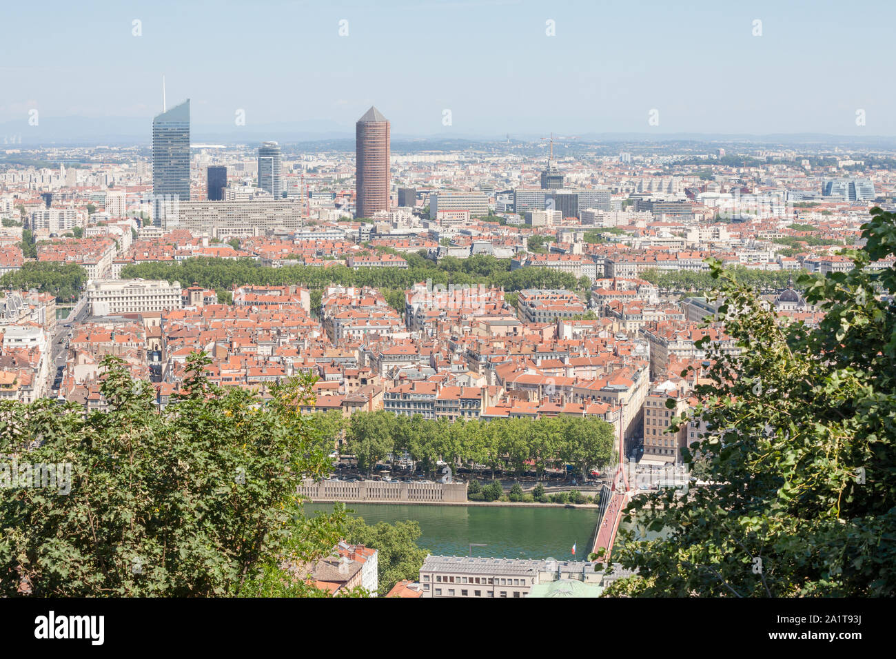 Aerial panoramic view of Lyon with the skyline of Lyon skyscrapers visible in background and Saone river in the foregroud, with the narrow streets of Stock Photo