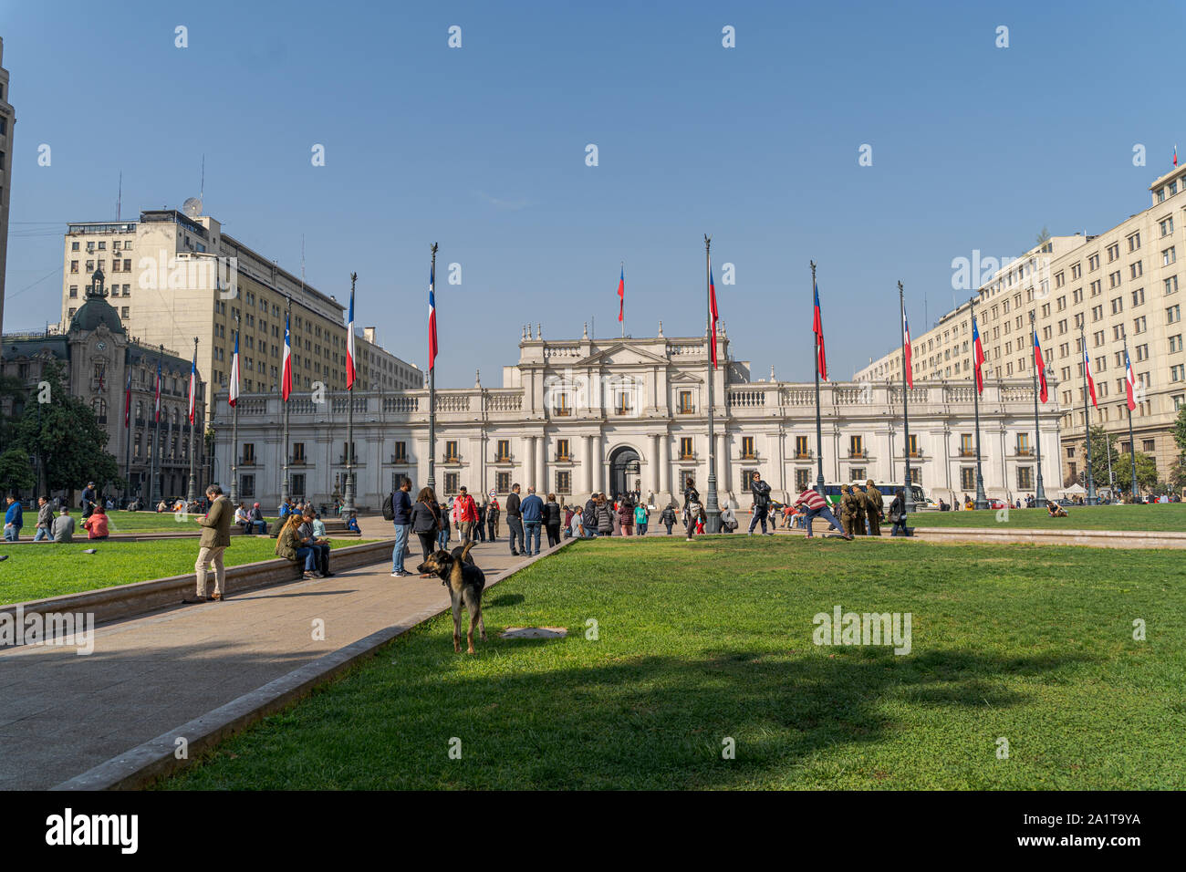 Santiago, Chile- April 22, 2019: Palacio de la Moneda Presidential Palace. Tourist walk in front of the palace. Stock Photo