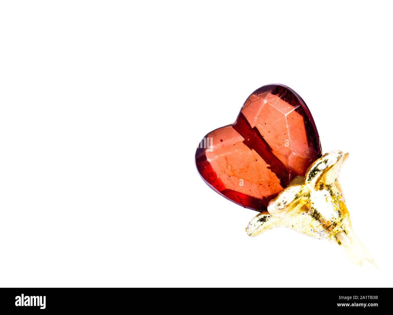 shining stone in the shape of heart against white background Stock ...
