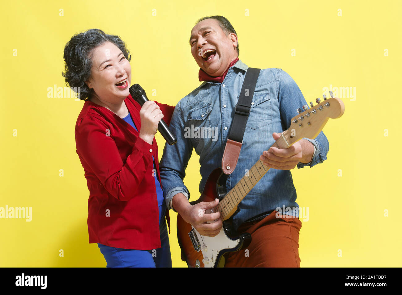 Sing happy old man playing the guitar Stock Photo