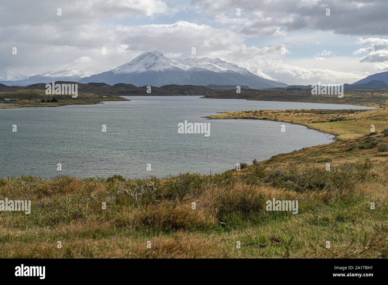 View of the Ultima Esperanza Sound with snowy mountain peak on the background, Puerto Natales, Chile Stock Photo