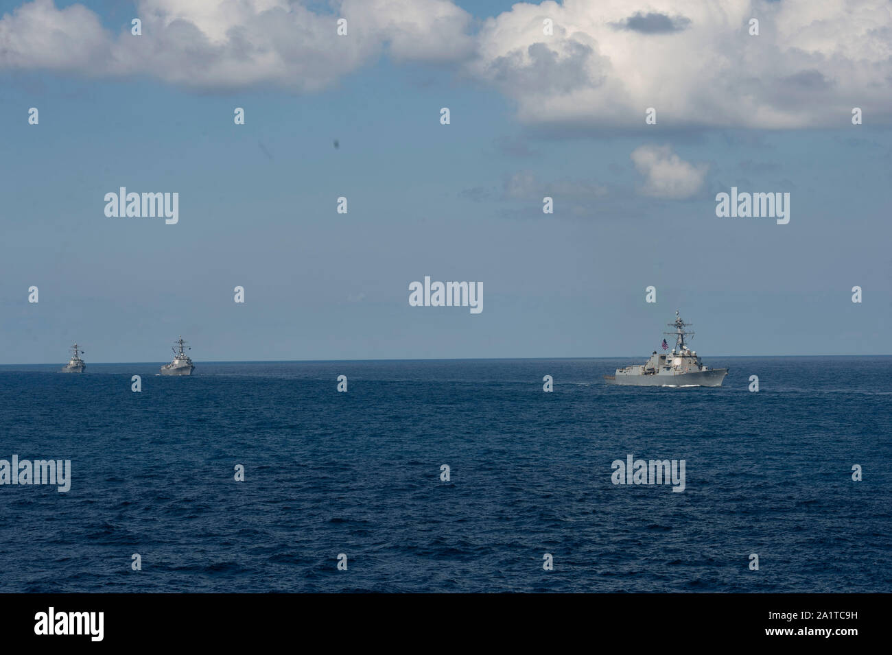190928-N-PI330-0267 ATLANTIC OCEAN (Sept. 28, 2019) The Arleigh-Burke-class guided-missile destroyers USS James E. Williams (DDG 95), USS Stout (DDG 55) and USS Truxtun (DDG 103) move in formation. Carrier Strike Group 10 is underway conducting normal operations. (U.S. Navy Photo by Mass Communication Specialist 3rd Class Andrew Waters/Released) Stock Photo