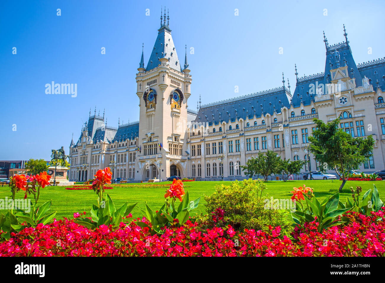 Beautiful summer landscape of Palace of Culture from Iasi, Romania flower garden in front. Stock Photo