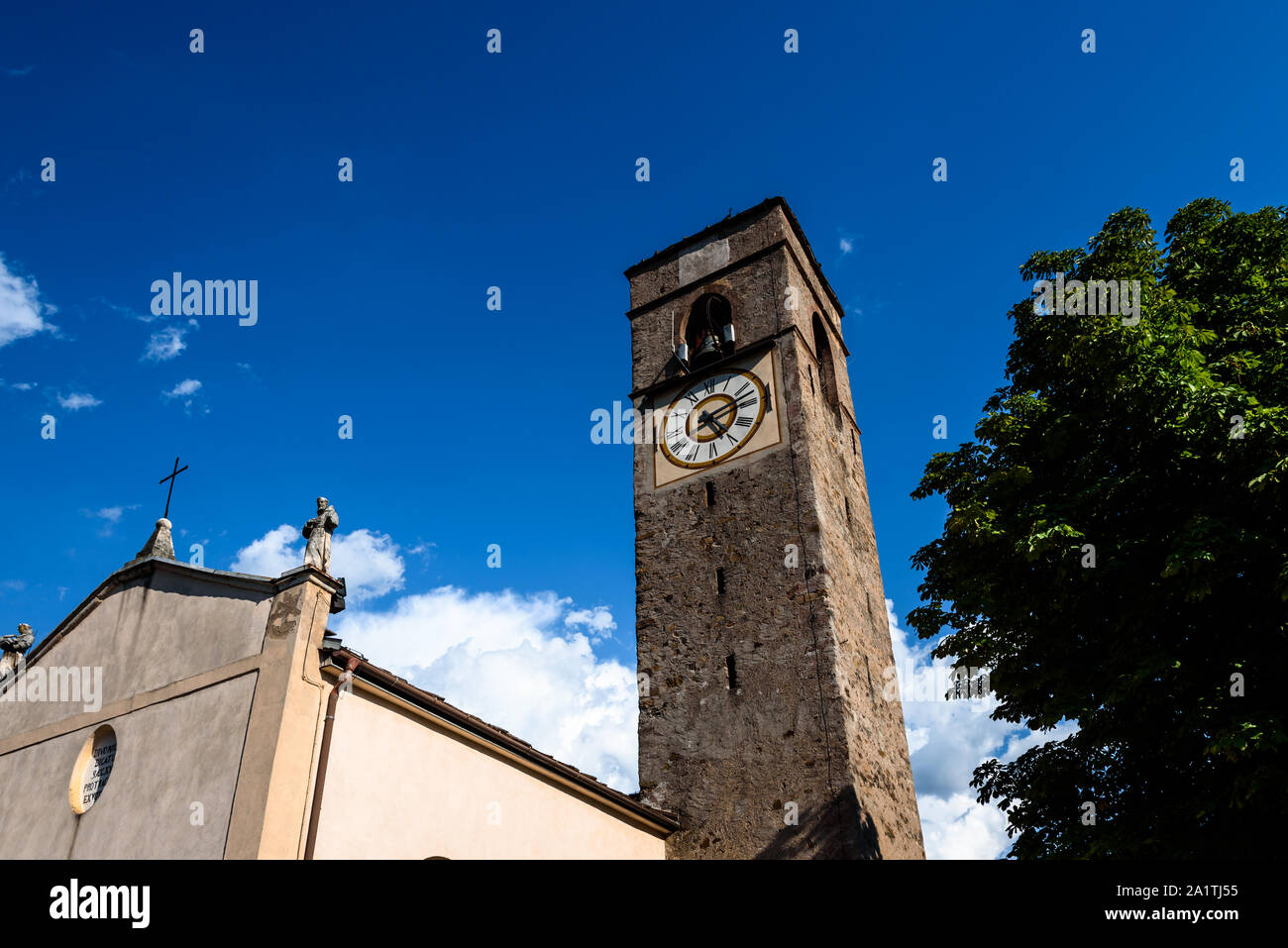 view of the facade of an old church in val di cembra (dolomites) italy Stock Photo