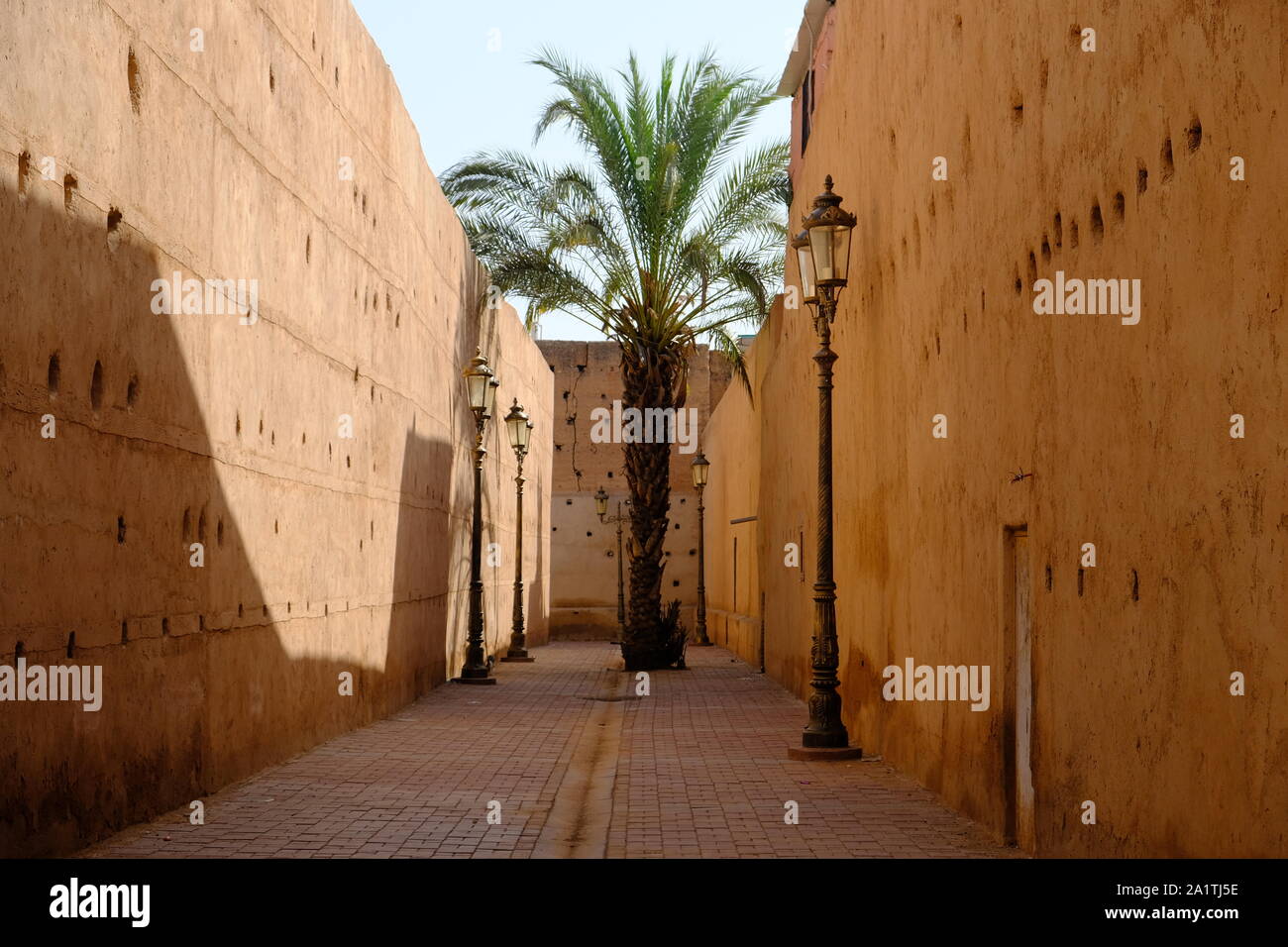 Morocco Marrakesh red city medina street photo, ramparts of beaten clay Stock Photo