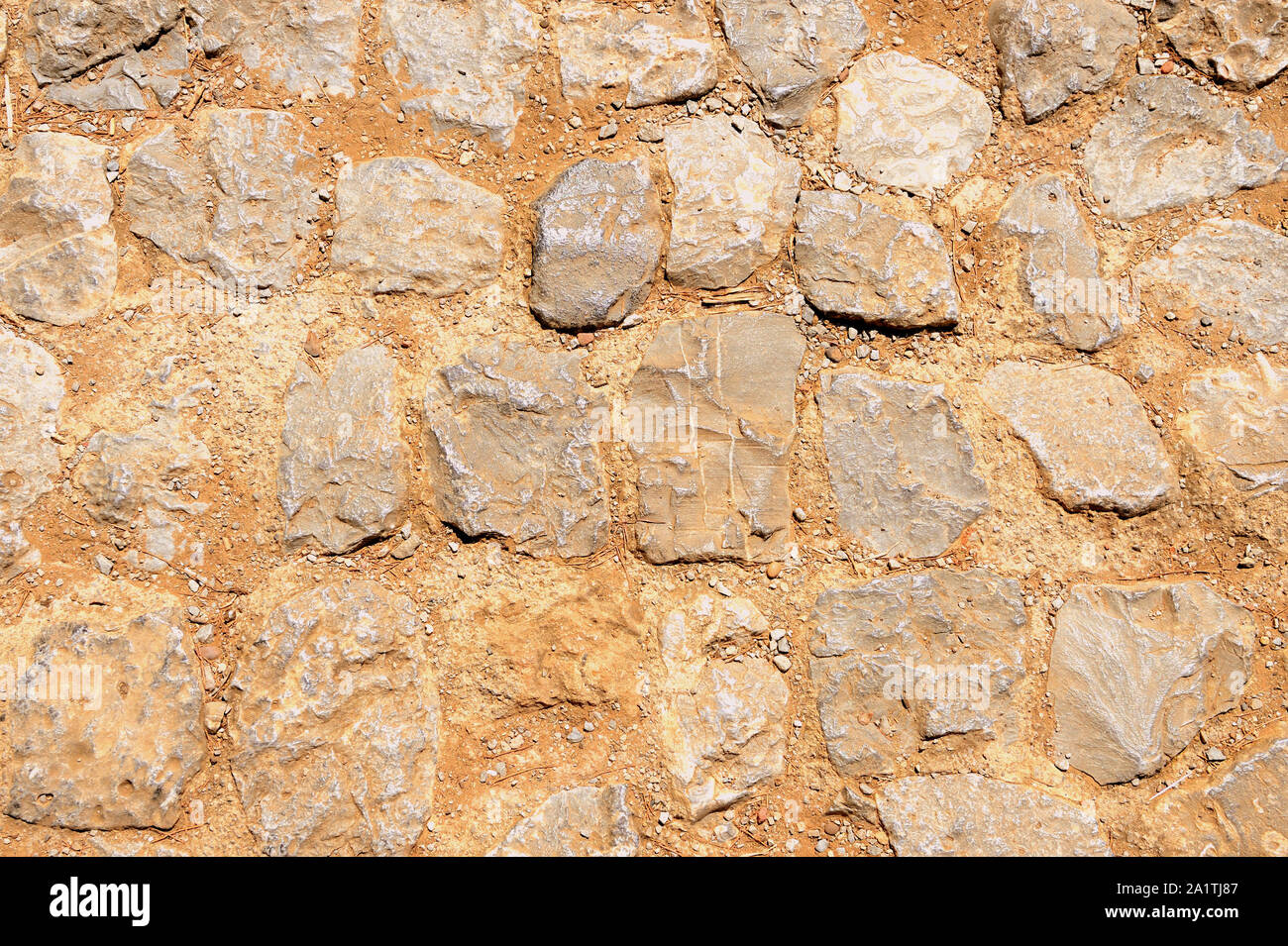 Old stone footpath close up. Abstract background Stock Photo