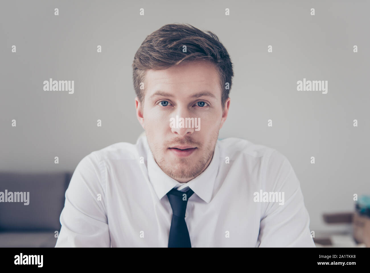 White collar employee. Portrait of young handsome serious elegan Stock ...
