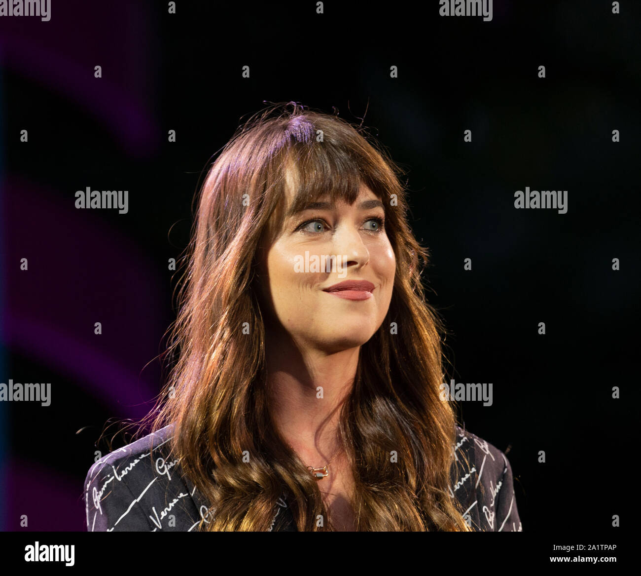 New York, NY - September 28, 2019: Dakota Johnson speaks on stage