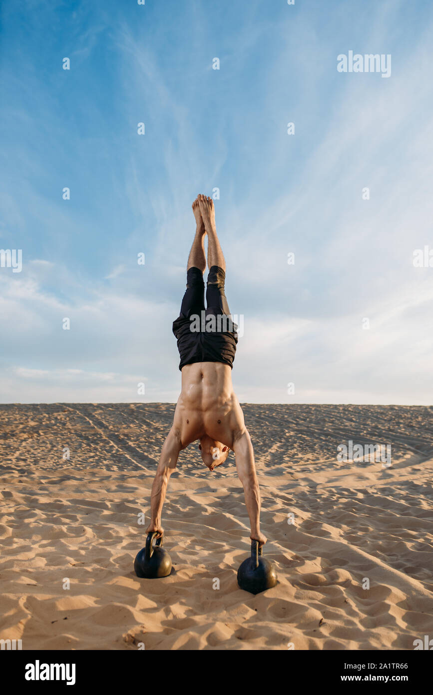 Strong man stands hands hi-res stock photography and images - Alamy