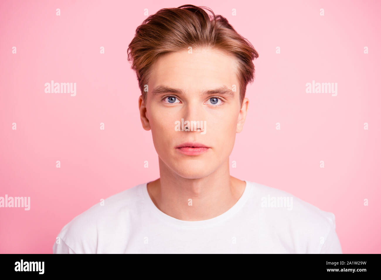 Close Up Portrait Of Brunet Hair Man Isolated On Pastel Pink Wal