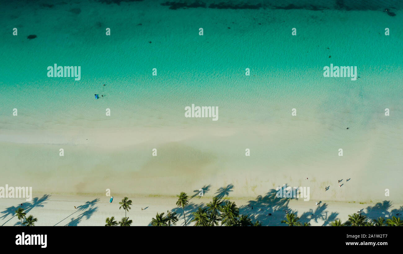 Tropical sandy beach with wave and turquoise water,copy space for text, aerial view. Ocean with waves and tropical beach. Summer and travel vacation concept Stock Photo
